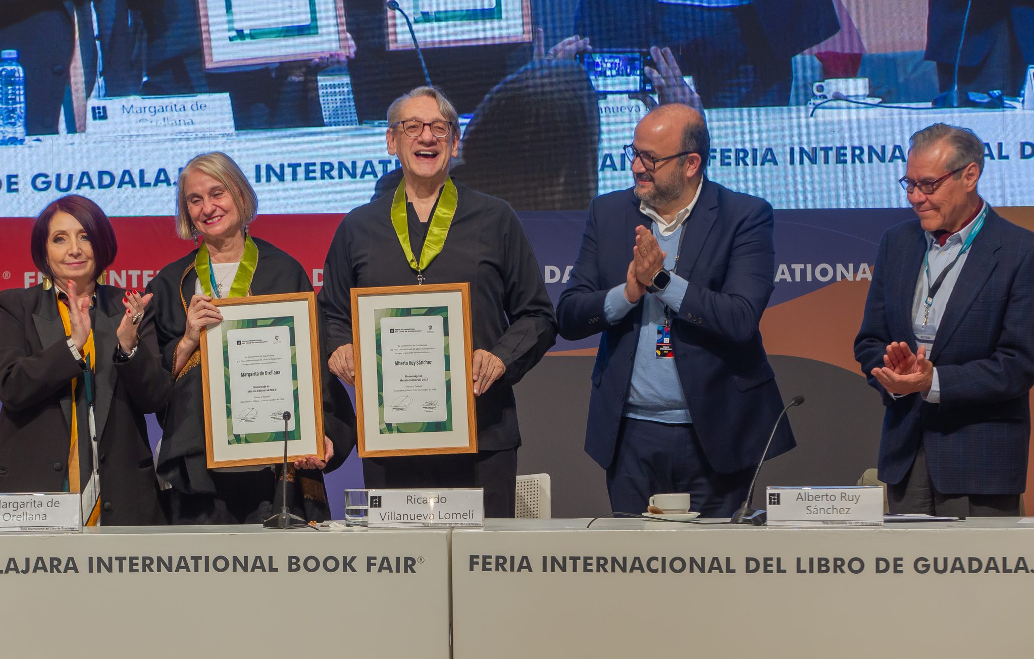 Homenaje al Mérito Editorial para Margarita de Orellana y Alberto Ruy Sánchez, creadores de Artes de México con la participación de Marisol Shulz Directora General de la Feria, el Rector de la Universidad de Guadalajara Ricardo Villanueva y el escritor Alfonso Alfaro en la XXXVII Feria Internacional del Libro de Guadalajara. Guadalajara, Jalisco. México. Lunes 27 de noviembre del 2023. (© FIL/Eva Becerra)